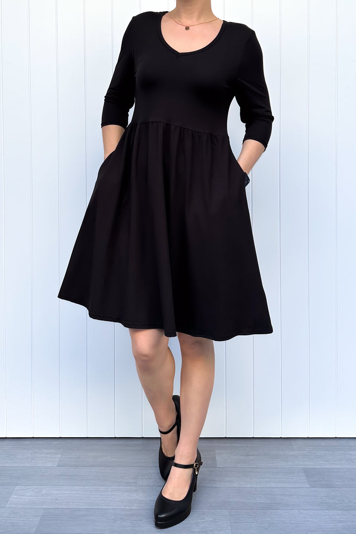Black - 3/4 Sleeve Skater Dress - Knee Length - Pockets