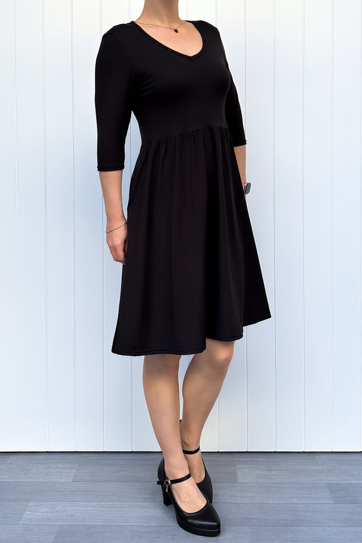 Black - 3/4 Sleeve Skater Dress - Knee Length - Pockets