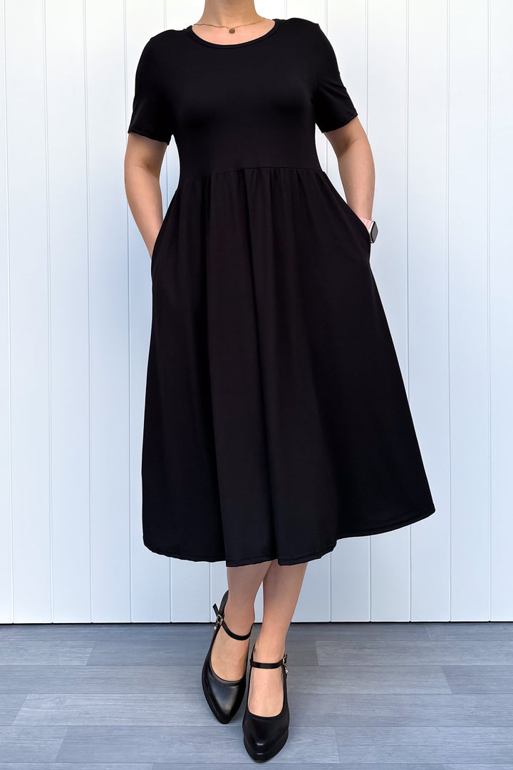 Black - Midi Dress - Short Sleeve - Pockets