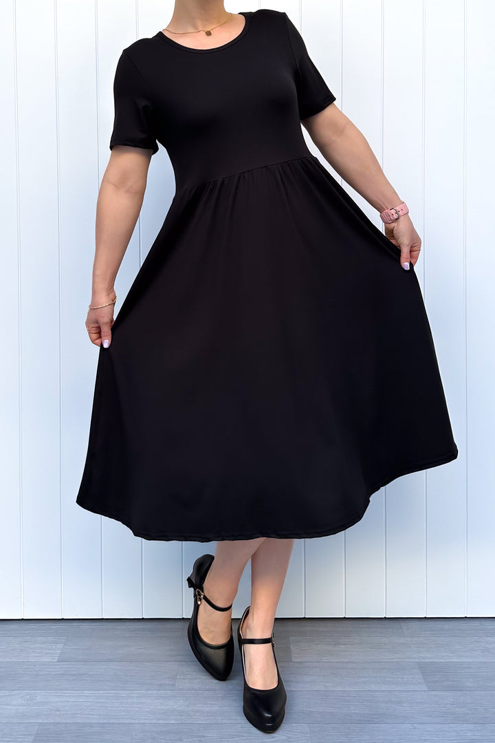 Black - Midi Dress - Short Sleeve - Pockets