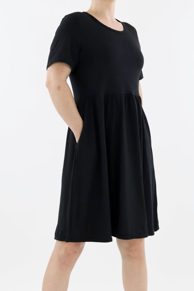 Black - Short Sleeve Skater Dress - Knee Length - Side Pockets Knee Length Skater Dress Pawlie   